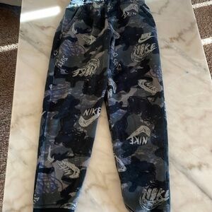 Nike- color: black and grey, size: large, condition: used.